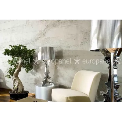 Salonda beton görünümlü duvar paneli ile modern ve sade dekorasyon uygulaması